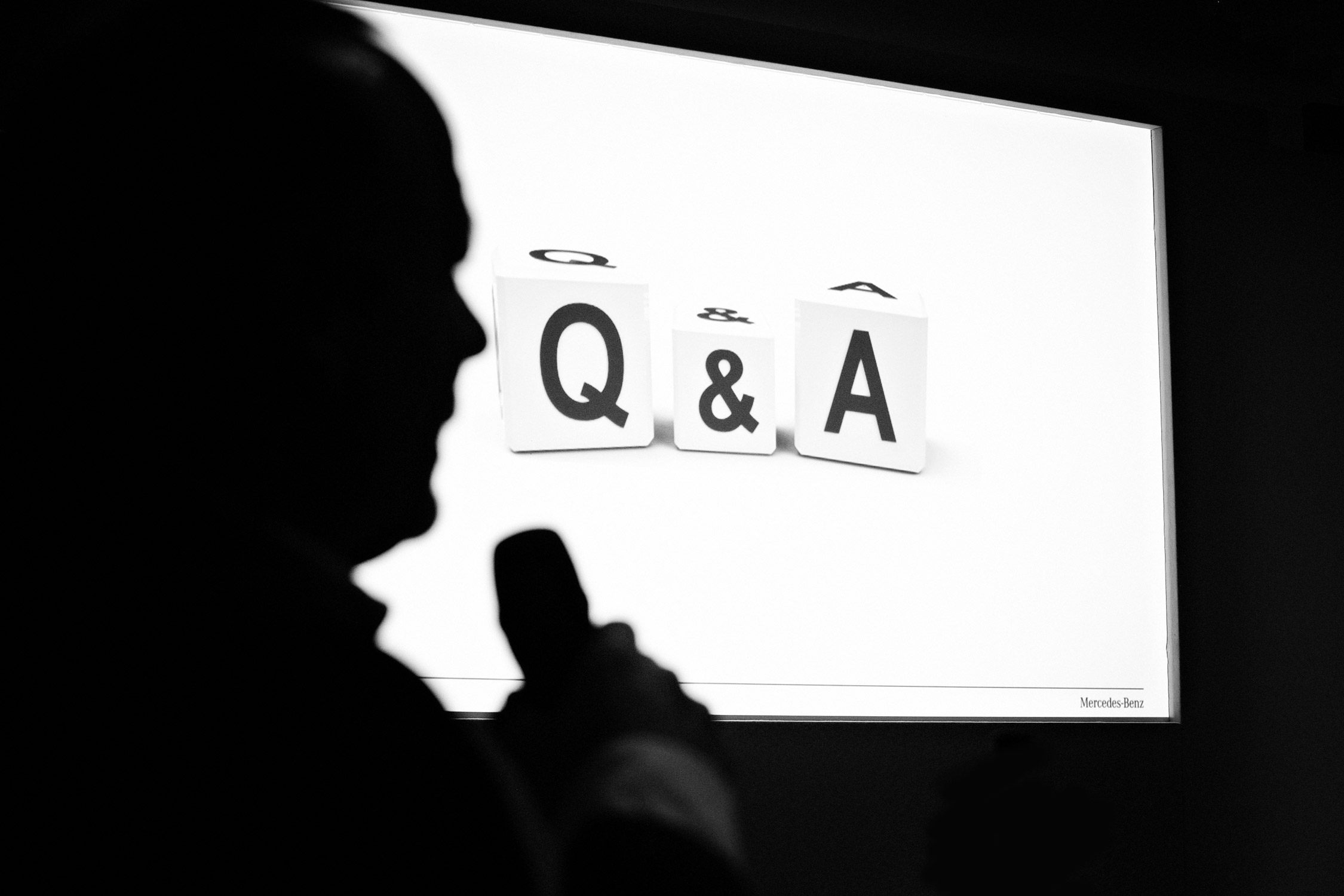Question and answer session photography at a University of Cambridge conference.