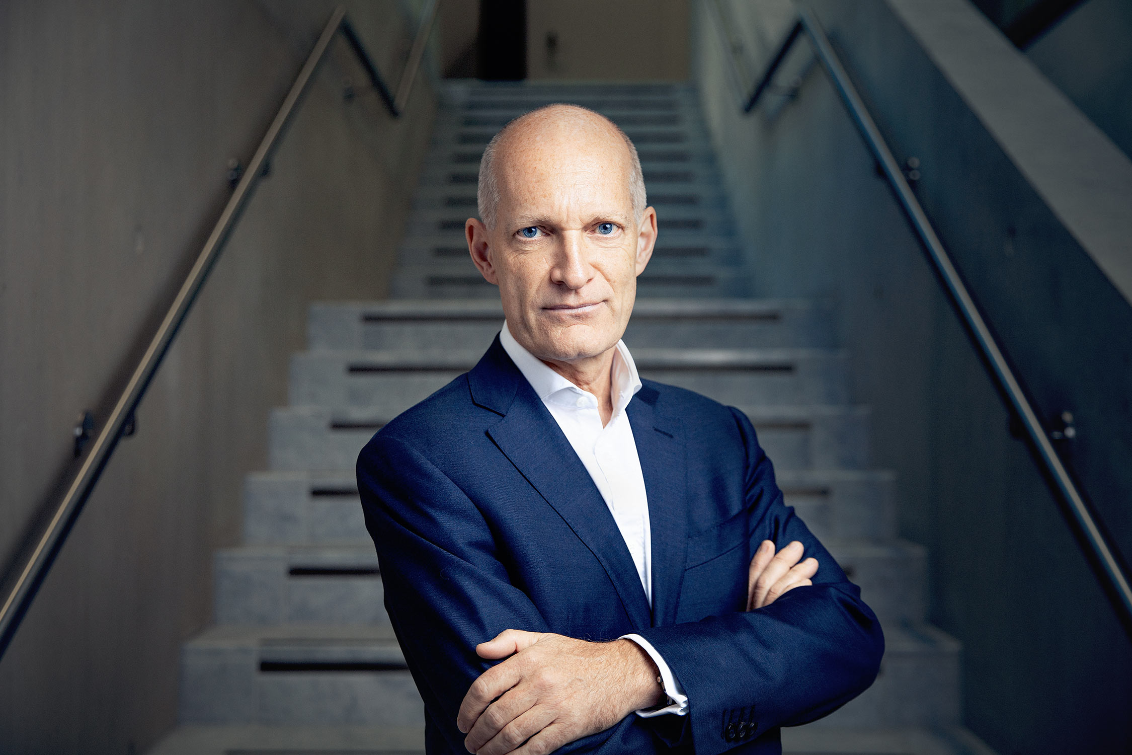 Professional business portrait of a male academic at the Judge Business School, University of Cambridge.