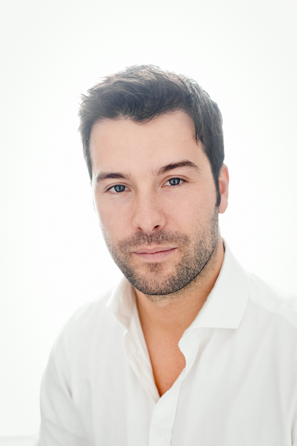 Modern studio headshot portrait of a man in the StillVision Photography studio, Cambridge.